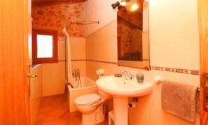 Bathtub, hair dryer, towels