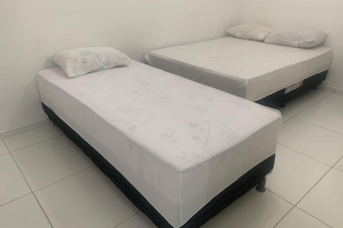 Triple Room (1 Double bed + 1 Single bed)