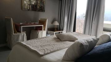 Blackout curtains, iron/ironing board, free WiFi, bed sheets