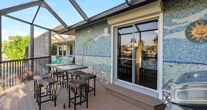 Waterfront Perfection! Beautiful New Dock, Heated Saltwater Pool and Spa.