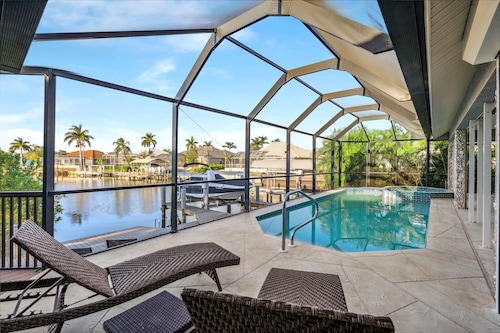 Waterfront Perfection! Beautiful New Dock, Heated Saltwater Pool and Spa.