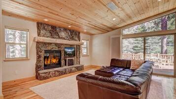 House, Multiple Beds, Jetted Tub | Living room | 40-inch TV with cable channels, fireplace