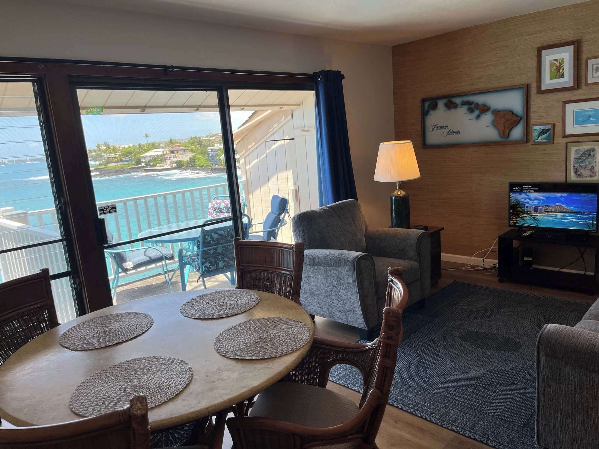 Condo, 1 King Bed, Balcony, Ocean View (Sea Village #1303) | Living area | 35-inch flat-screen TV with digital channels