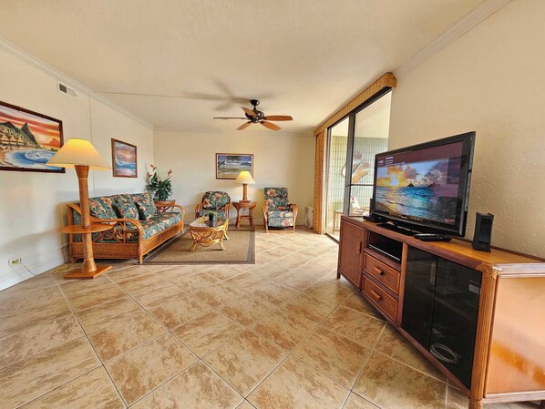 Condo, Multiple Beds, Balcony, Pool View (White Sands Village #309) | Living area | 42-inch flat-screen TV with digital channels