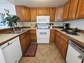 Condo, Multiple Beds, Balcony, Pool View (White Sands Village #309) | Private kitchen | Fridge, microwave, oven, stovetop