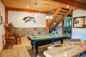 Entertainment room with full size pool table which easily converts to ping pong 