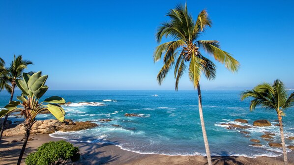 On the beach, sun-loungers, beach towels