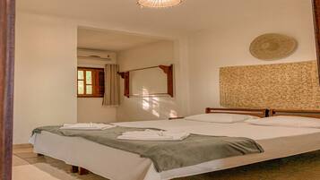 Standard Double Room, 1 King Bed | Laptop workspace, WiFi (free), individually decorated, bed sheets