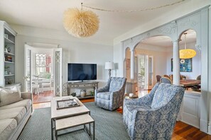 Smart TV, fireplace, books