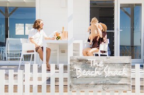 Enjoy a casual dining experience at The Beach Shack, where a seating area awaits.