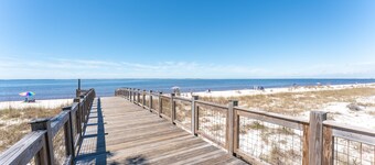 Beach House with Golf Cart, Grill & Two Pools!