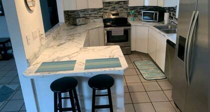 Great Location w/Heated Pool with beautiful outdoor patio/bar area!