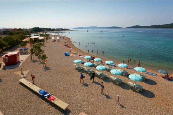 Beach nearby, sun loungers