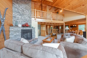 Älytelevisio, takka, DVD-soitin, pöytätennispöytä