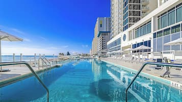 Outdoor pool, open 7:00 AM to 8:00 PM, free cabanas, pool umbrellas