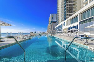 Outdoor pool, open 7:00 AM to 8:00 PM, free cabanas, pool umbrellas