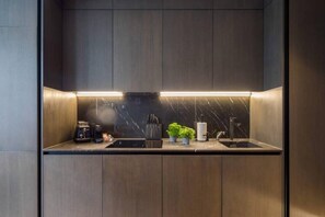 Apartamento | Cozinha privada | Geladeira, micro-ondas, fogão, cooktop