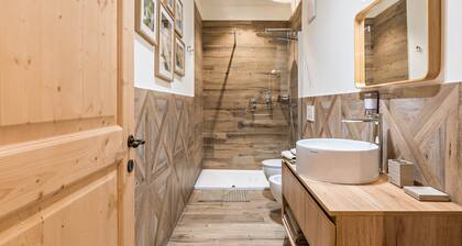 Apartment “Wellness Lodge Riccardo” with Lake and Mountain View, Sauna and Whirlpool