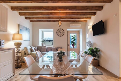 Appartement "Wellness Lodge Riccardo" avec vue sur le lac et les montagnes, sauna et bain à remous