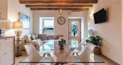 Appartement "Wellness Lodge Riccardo" avec vue sur le lac et les montagnes, sauna et bain Ă remous