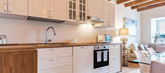 Appartamento "Wellness Lodge Riccardo" con vista sul lago e sulle montagne, sauna e idromassaggio