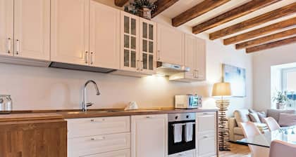 Appartement "Wellness Lodge Riccardo" avec vue sur le lac et les montagnes, sauna et bain Ă  remous