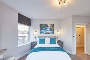 2 dormitorios, tabla de planchar con plancha, wifi gratis y ropa de cama