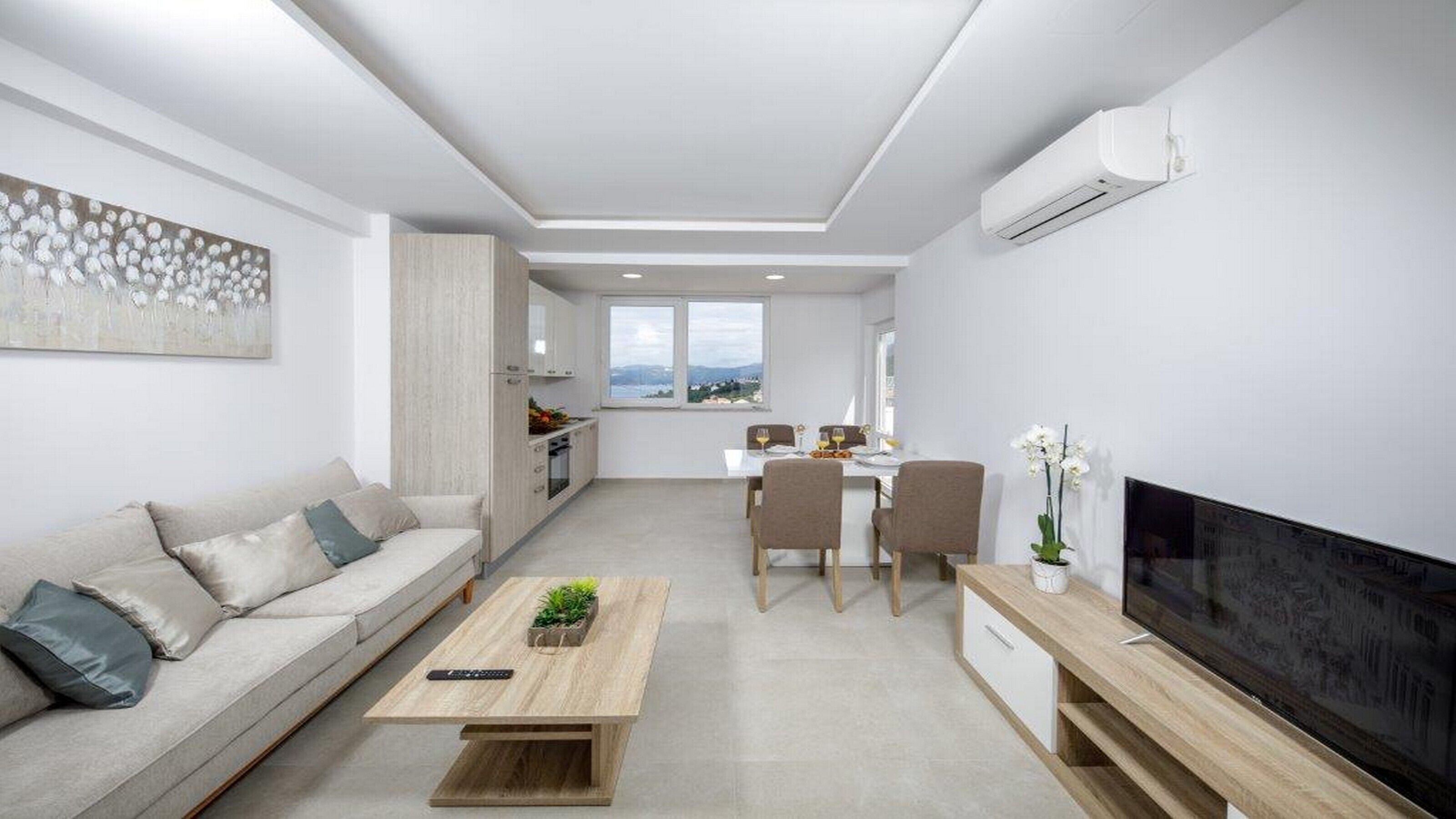 Apartment (One Bedroom Apartment with Jacuzzi an) | Wohnzimmer | 25-Zoll-Flachbildfernseher mit Satellitenempfang, Fernseher