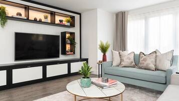 Apartemen (2 Bedrooms) | Area keluarga | TV