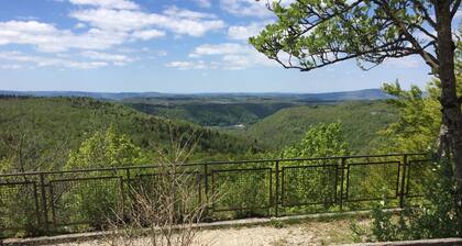 Cottages in the center of the Hedgehog waterfalls and lakes.
