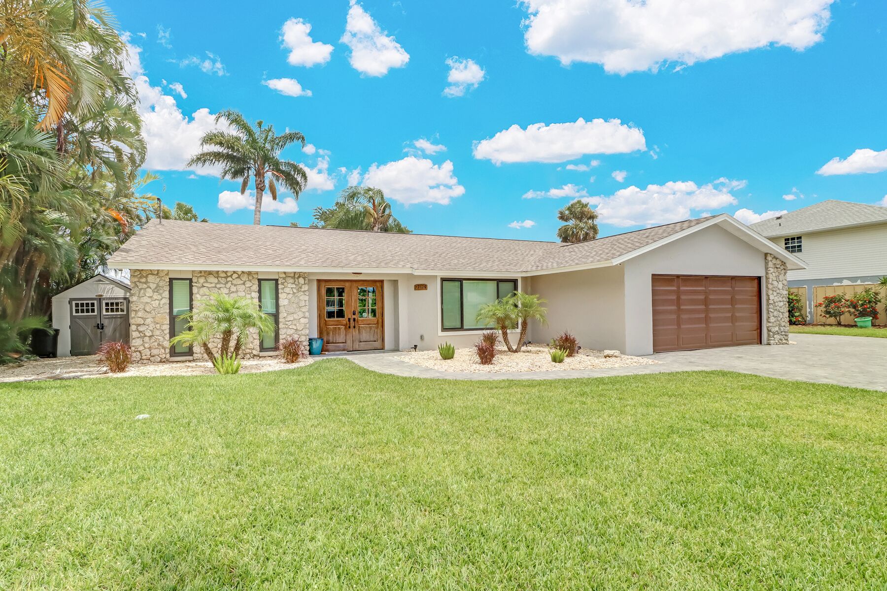 Canal vacation home with amazing screened lanai, pool and hot tub