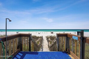 On the beach, sun-loungers