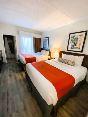 Deluxe Double Room | Desk, laptop workspace, blackout drapes, iron/ironing board - Karma Nest Extended Stay Suites (Tampa)