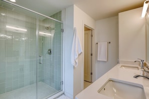 Combined shower/tub, hair dryer, towels, soap