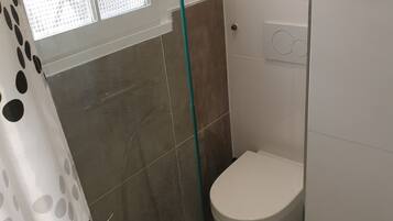 Hair dryer, towels, toilet paper