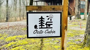 A sign for the Osito Cabin, indicating it is part of Wildling Ventures, LLC.