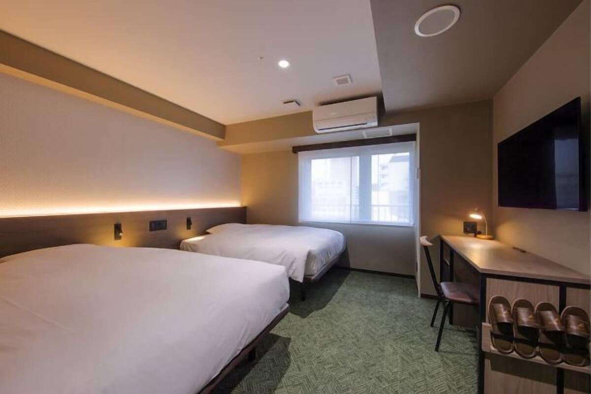 Premium bedding, blackout curtains, iron/ironing board, free WiFi