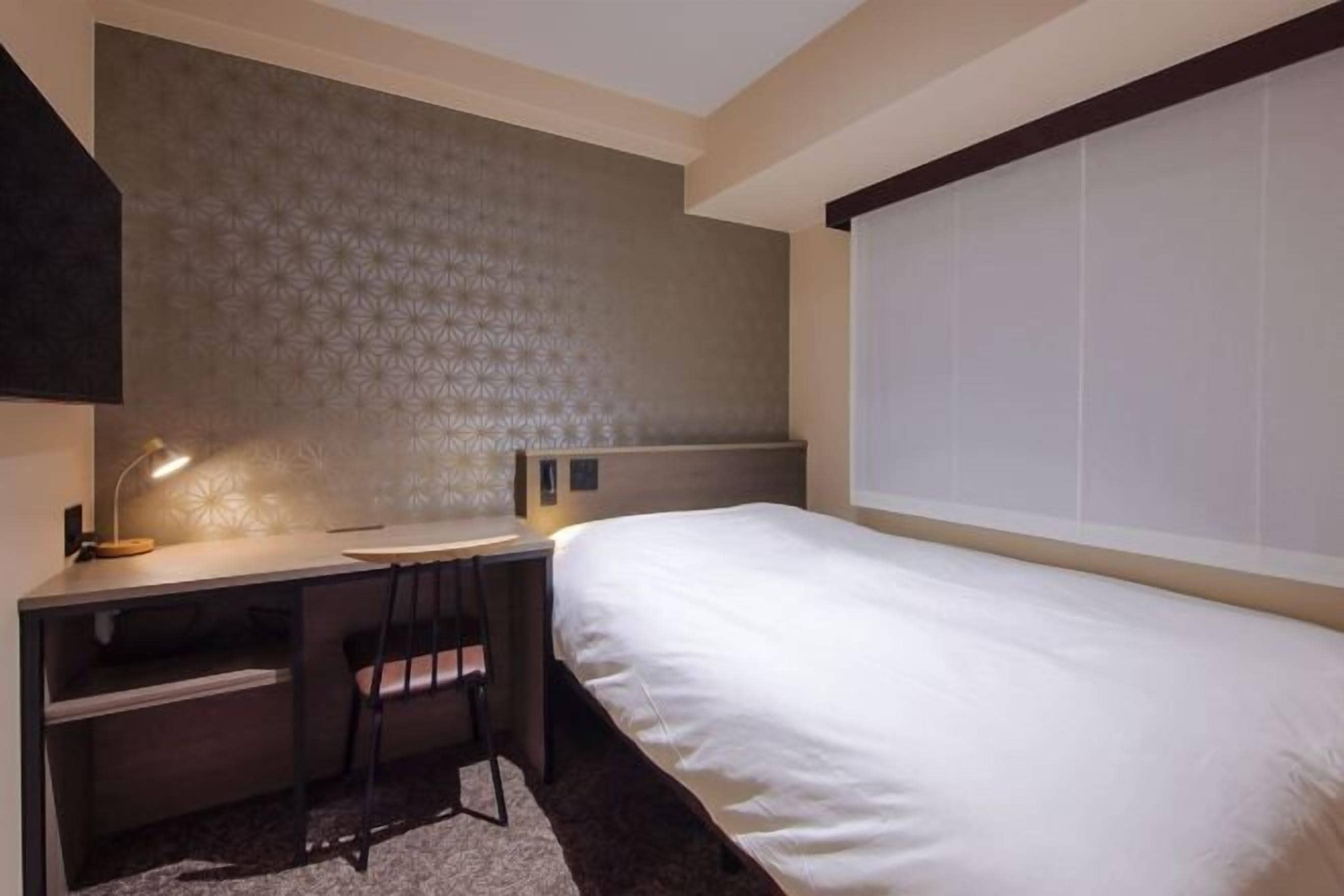 Premium bedding, blackout curtains, iron/ironing board, free WiFi