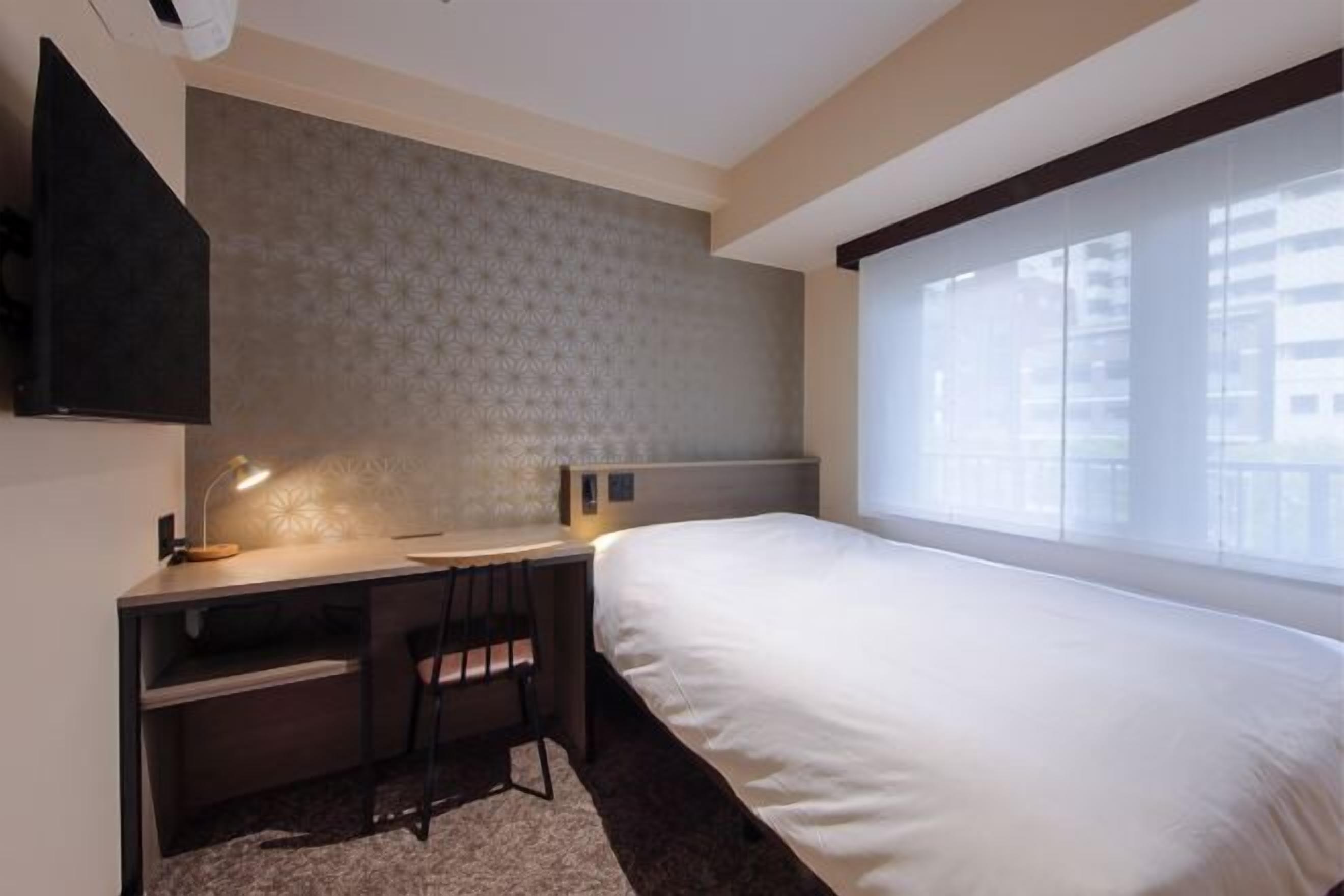 Premium bedding, blackout curtains, iron/ironing board, free WiFi