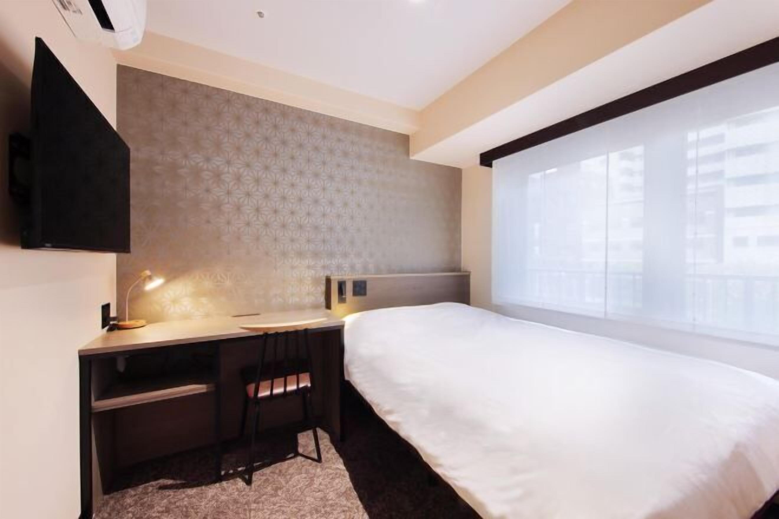 Premium bedding, blackout curtains, iron/ironing board, free WiFi