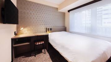 Premium bedding, blackout curtains, iron/ironing board, free WiFi