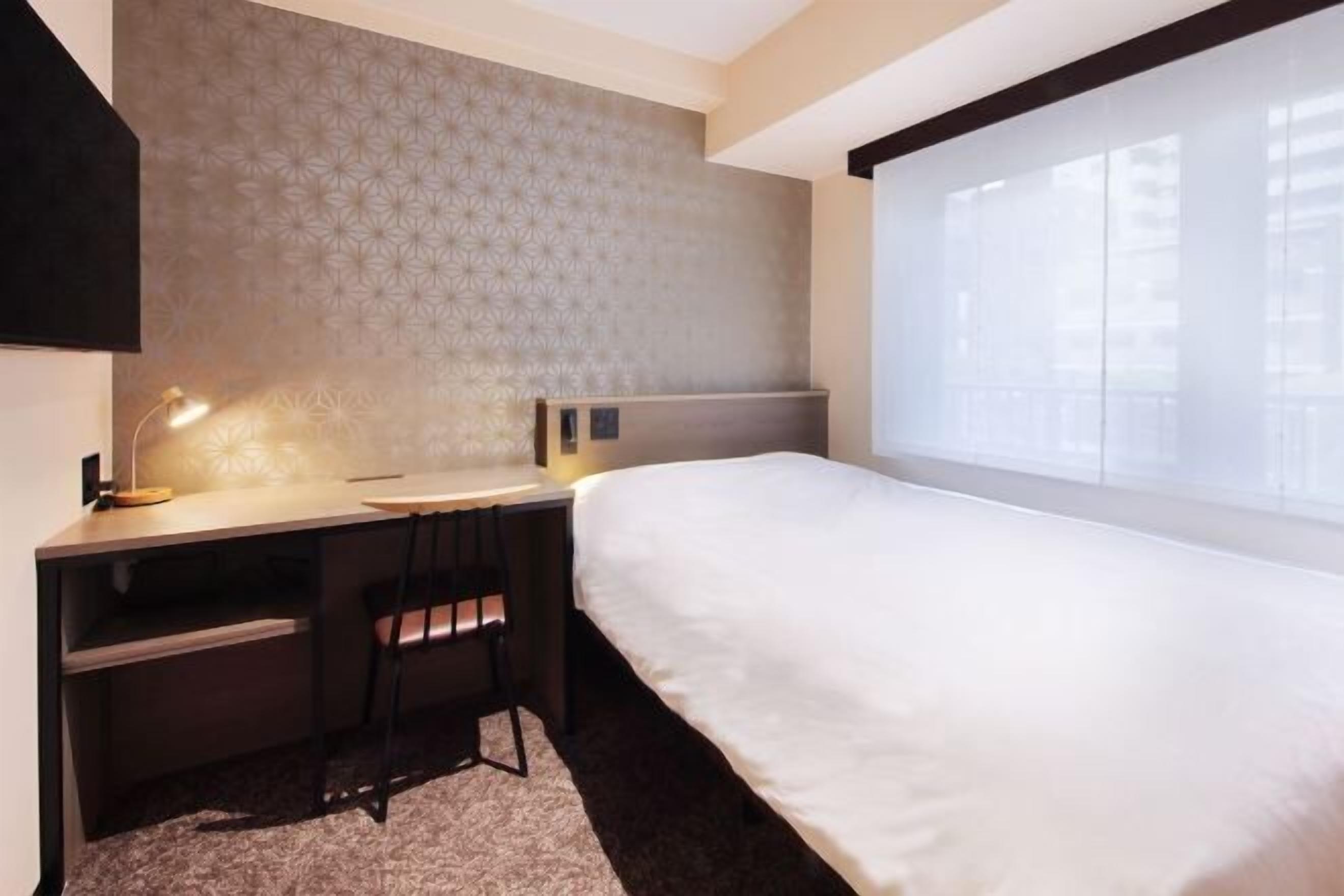 Premium bedding, blackout curtains, iron/ironing board, free WiFi