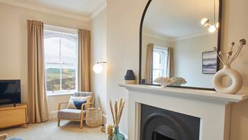 Apartemen | Area keluarga | TV layar datar