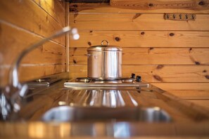 Fridge, stovetop, coffee/tea maker, electric kettle