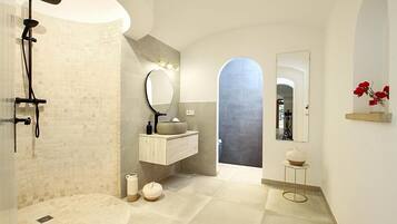 Bathtub, hair dryer, towels