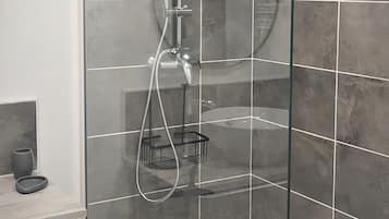 Shower, rainfall showerhead, soap, shampoo