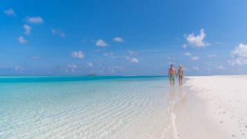 Beach nearby, white sand, sun loungers, beach umbrellas
