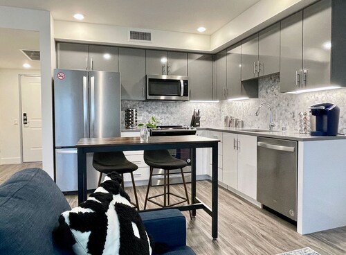 Work Here • Secure • Elevator • Luxe Kitchen & Bath • King Bed • W/D • Gig WiFi