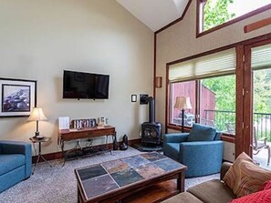 TV, fireplace - Beautiful Loft Condo in the Heart of Bigfork on the Swan River (Bigfork)