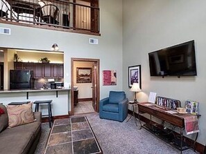TV, fireplace - Beautiful Loft Condo in the Heart of Bigfork on the Swan River (Bigfork)